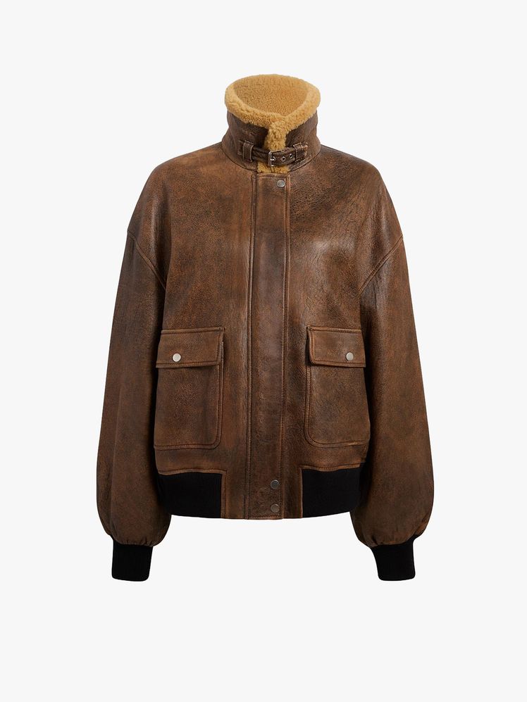 Image may contain Clothing Coat and Jacket