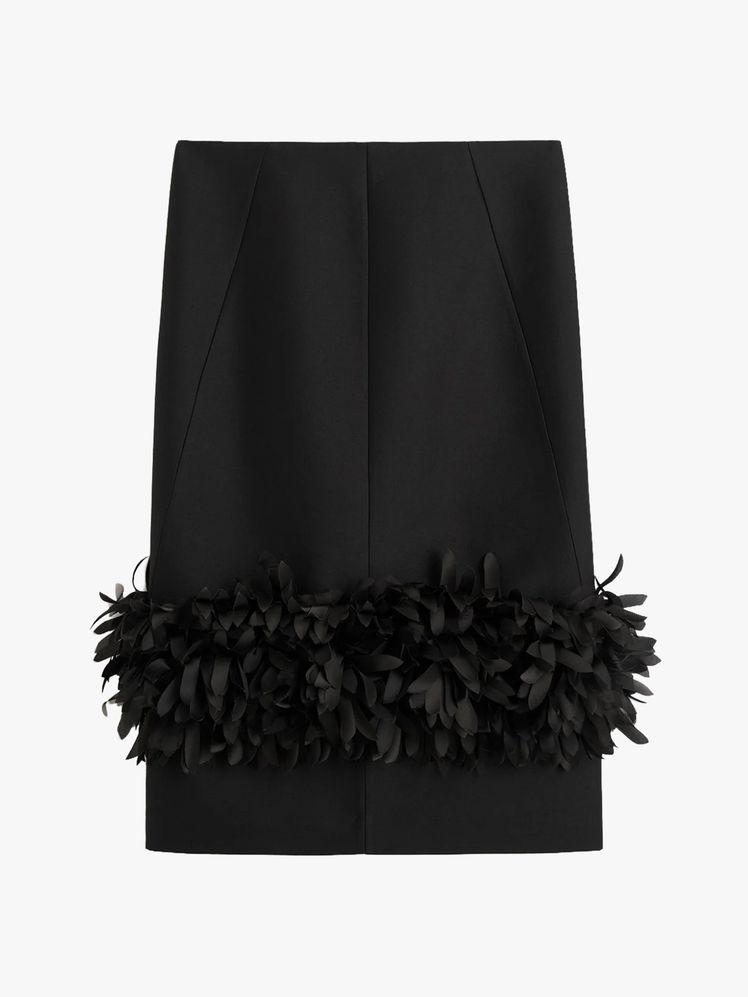 Image may contain Clothing Skirt Plant Miniskirt and Coat