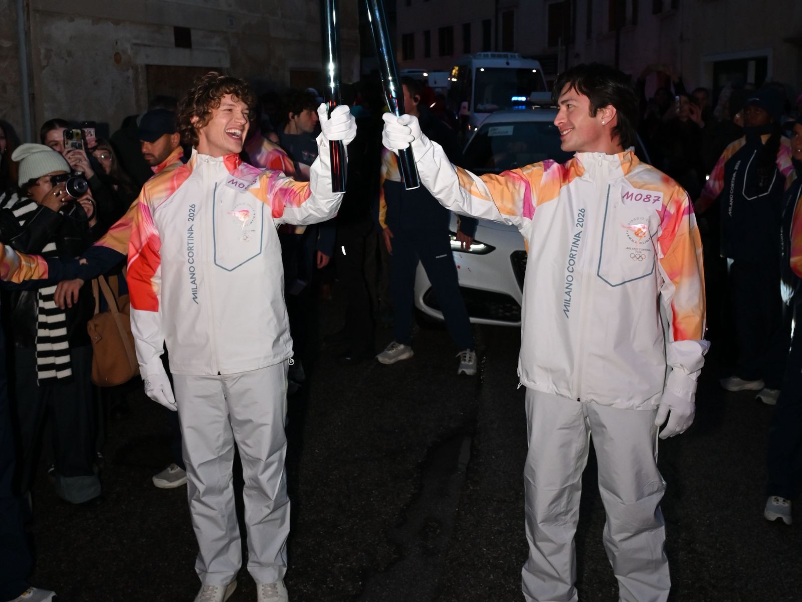 Hudson Williams and Connor Storrie Heated Up the Olympic Torch Relay in Northern Italy